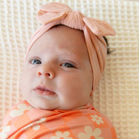 BRIGHT CORAL + PINK DAISY CHECKER | SWADDLE