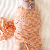 ORANGE + PEACH CHECKER | SWADDLE