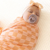 ORANGE + PEACH CHECKER | SWADDLE