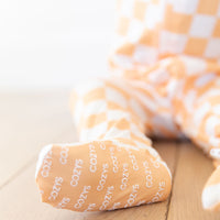 BRIGHT ORANGE + WHITE CHECKER | FOOTIE ONE PIECE