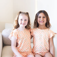 ORANGE SMILEY CHECKER | RUFFLE SHORT SET