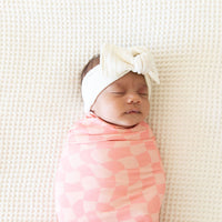 CORAL PINK WAVY CHECKER | SWADDLE