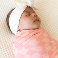 CORAL PINK WAVY CHECKER | SWADDLE