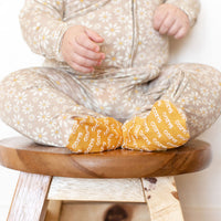 MUSTARD DAISY | FOOTIE ONE PIECE