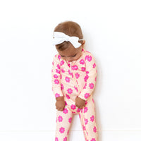 PINK DAISY | FOOTIE ONE PIECE
