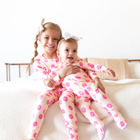 PINK DAISY | FOOTIE ONE PIECE