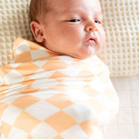 BRIGHT ORANGE + WHITE CHECKER | SWADDLE