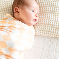 BRIGHT ORANGE + WHITE CHECKER | SWADDLE